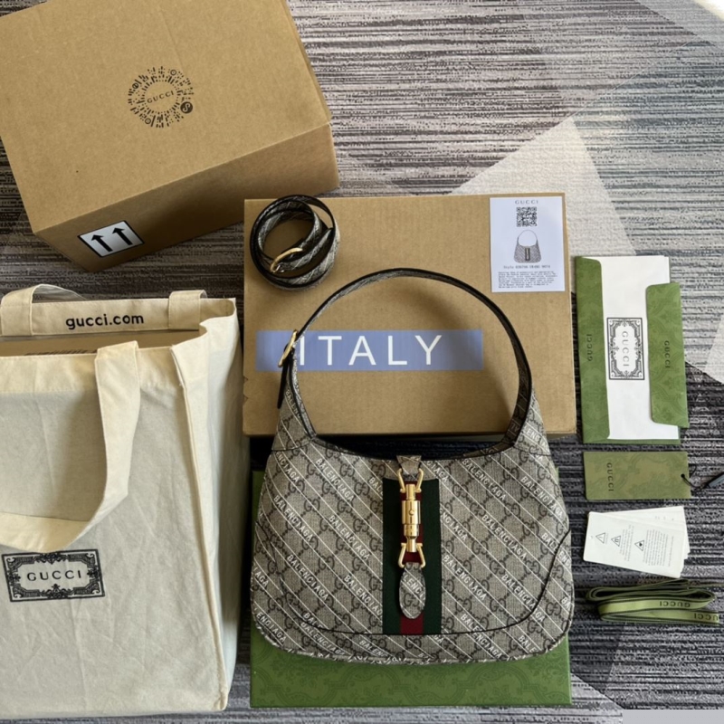 G*u*i top handle bags